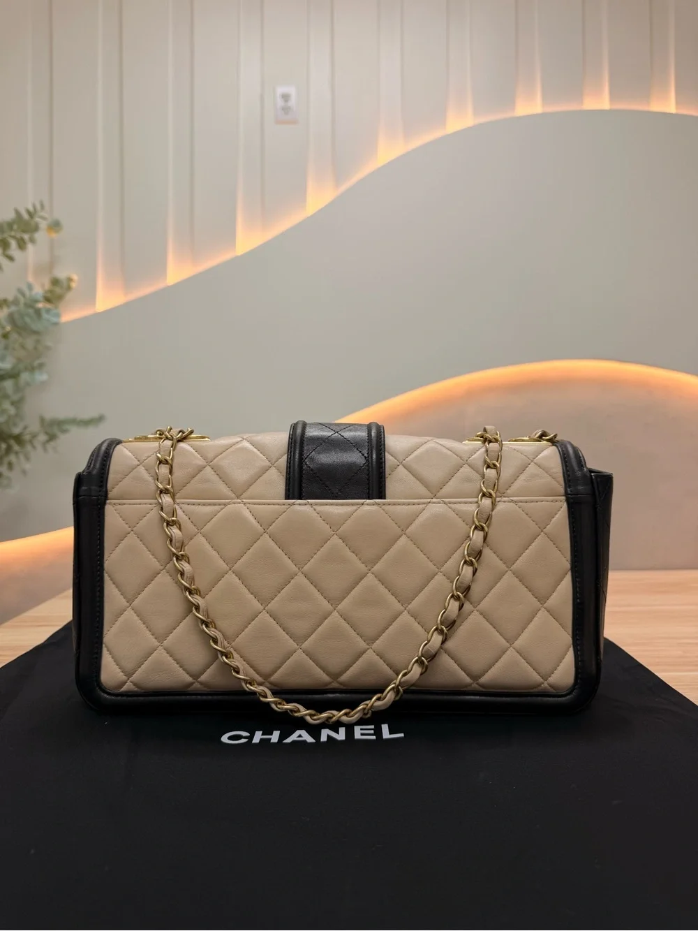 CHANEL Beige and Black Quilted Shoulder Bag with Gold Hardware
